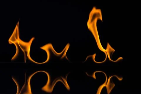 Flames isolated on black Stock Photos