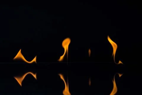 Flames isolated on black Stock Photos