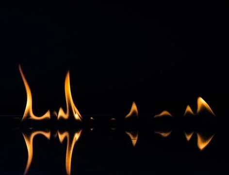 Flames isolated on black Stock Photos