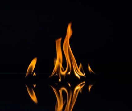 Flames isolated on black Stock Photos