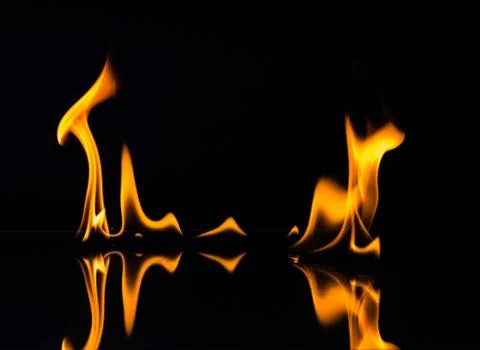 Flames isolated on black Stock Photos
