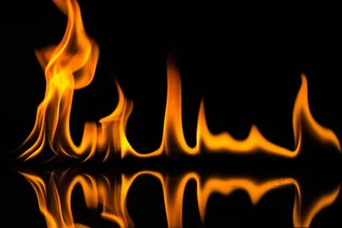 Flames isolated on black Stock Photos