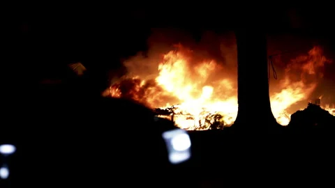Flames from large fire in the city at night. Stock Footage 297437024