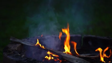 Flames in a leaf burner in a garden to make organic fertilizer from burning. Video stock 301776886
