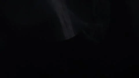 Flames of light shine in the darkness. Stock Footage 318835684