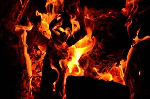 Flames of natural fire in nature while camping Stock Photos