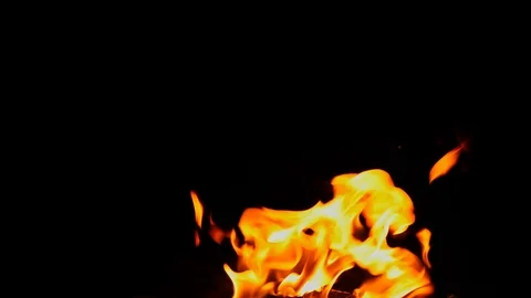 Flames over black background Stock Footage 127150364