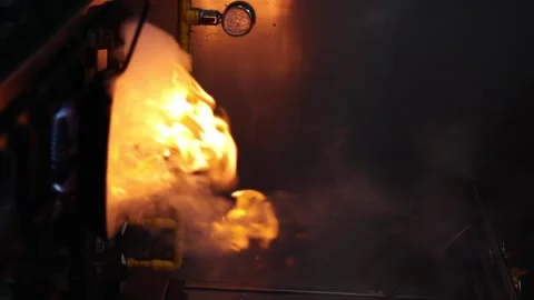 Flames in a Pan While Cooking Stock Footage 284458644