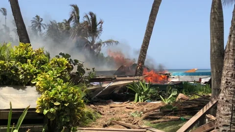 Flames roar after a devastating fire in Las Terrenas, Dominican Republic 스톡 동영상 195537145
