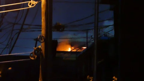 Flames on the roof in the dark Stock Footage 116120302