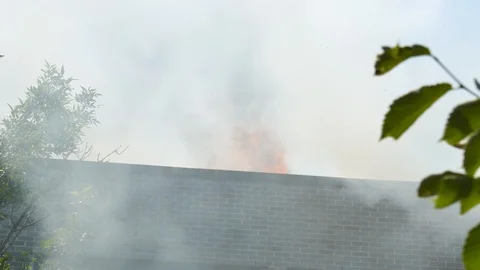 Flames on the roof Stock Footage 114810255