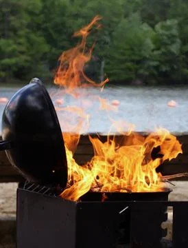 Flames Shooting From Grill Stock-Fotos