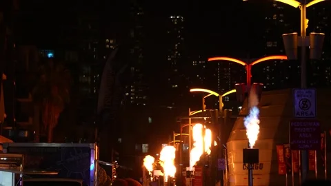 Flames shooting from lamp posts at the Firelight Festival in Docklands Stock Footage 278631972