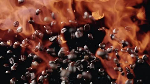 Flames Surround The Coffee Beans As They Are Tossed Into The Air Stock Footage 254996886