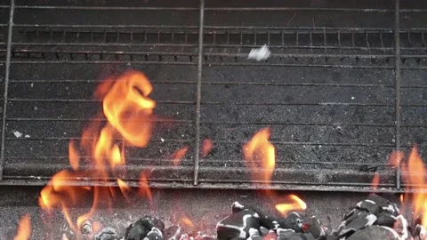 Flaming Barbeque fire Stock Footage 154063679