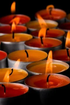 Flaming candles Stock Photos