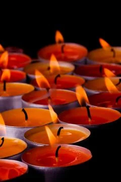 Flaming candles Stock Photos