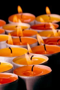 Flaming candles Stock Photos
