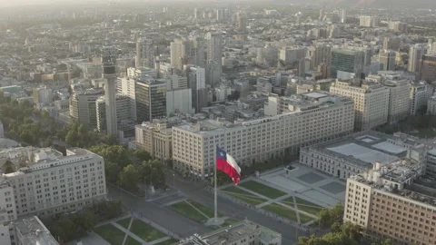 Flaming flag Chile Dron in center of city The Moneda in Santiago the Chile Stock Footage 139523978