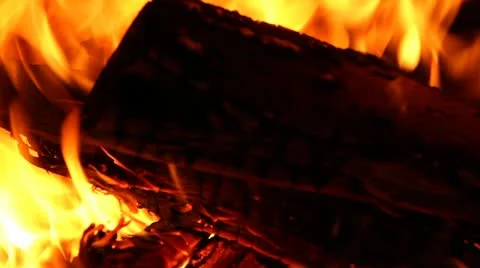 Flaming log in the fireplace Stock Footage 22338187