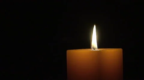 Flaming Orange Candle in the Dark Stock Footage 45904580