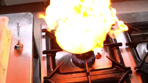 Flaming Pan Cooking Stock Footage 319950559