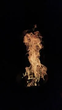 Flaming red fire on black background and portrait mode 02 Stock Photos