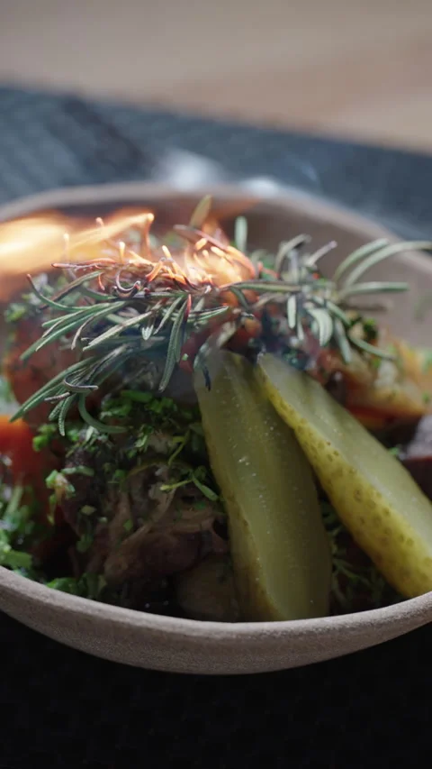 Flaming rosemary on beef stew Video stock 324160755