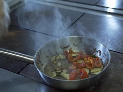 Flaming stir fry slow motion Stock Footage 76055877