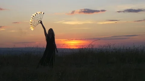 Flaming torches at sunrise Stock Footage 67627756