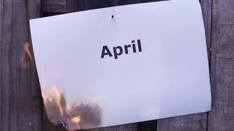 Flaming word April Stock Footage 75543374