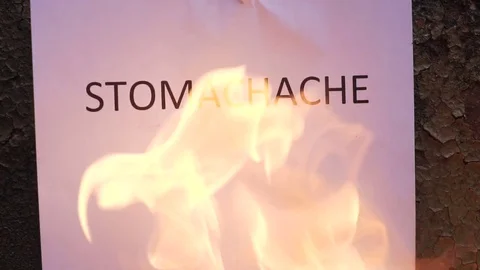Flaming word stomachache Video stock 78005545
