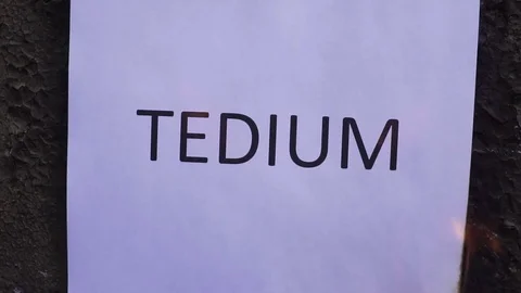 Flaming word tedium slow motion Video stock 78079191