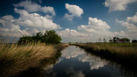Flanders springtime landscape :  water canal time lapse Stock Footage 107543361