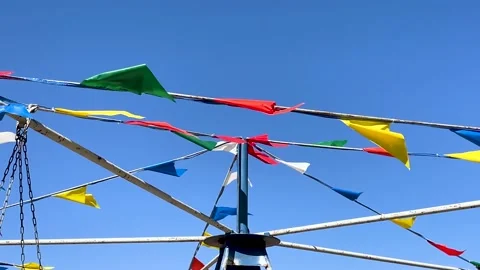 Flapping Carousel Flags Close-Up Video stock 237837061