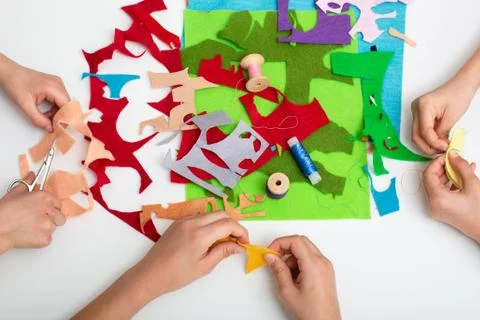 Flaps of colored fabric on the table. View from above Stock Photos