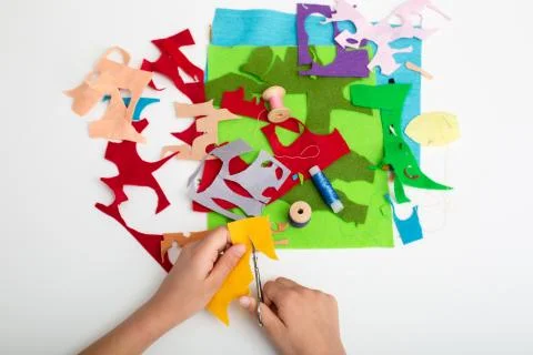 Flaps of colored fabric on the white table. Stock Photos