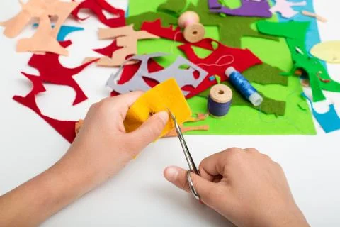 Flaps of colored fabric on the white table. Stock Photos