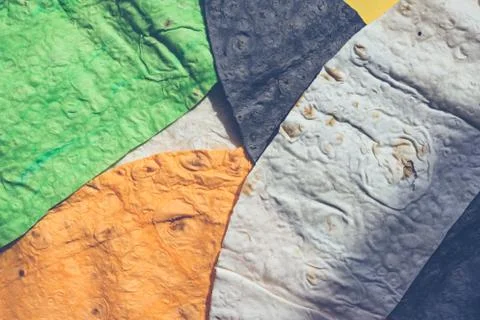 Flaps of colored tortillas Stock Photos