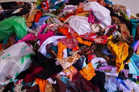 Flaps rag pieces of colorful fabrics which have been left from the sewing. Stock-Fotos