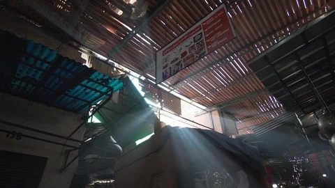 Flare and light rays in the souk of Marrakech Morocco slow motion side Stock Footage 87457396