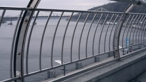 Flare effect. Slow motion. Metal fence. walk around the city. Stock Footage 127485281