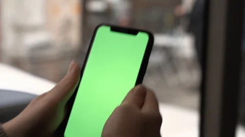Flare effect. Slow motion. Smartphone with a green screen. A ride in public tran Stock Footage 127485353