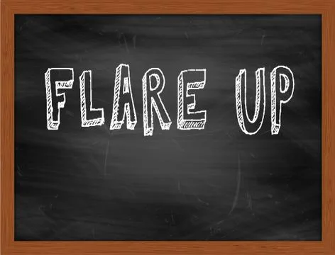 FLARE UP  hand writing text on black chalkboard Illustrazione stock