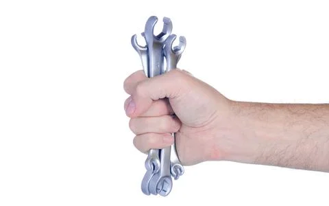 Flare nut wrench in hand Stock Photos