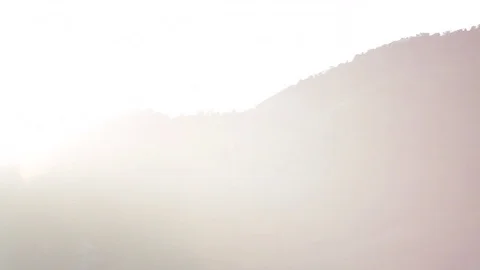 Flare at sunset on mountain over Barcis Lake Stock Footage 78009577