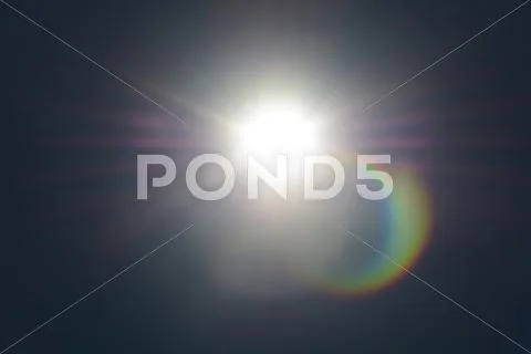 Flares in bright sunlight during eclipse Stock Photos