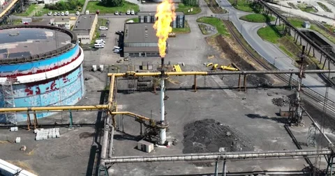 Flaring chimney at industrial complex. Aerial drone view. Video stock 243839034