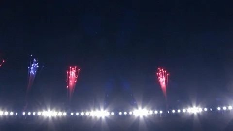 Flaring stadium lights and pyro firework... | Stock Video | Pond5