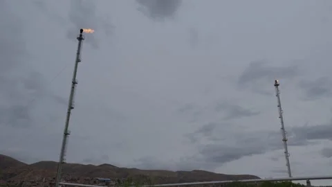 Flaring, Two gas refinery platforms in an oil and gas refining plant Stock Footage 310339588